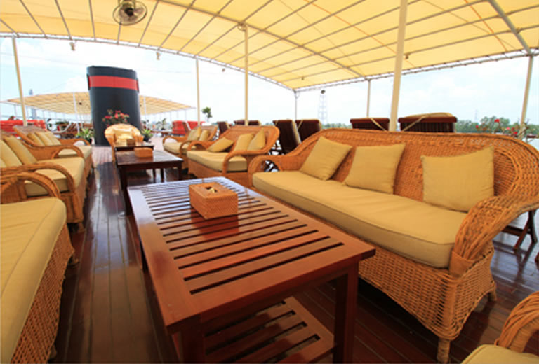 Relax and enjoy the passing sights on our 360-degree promenade decks