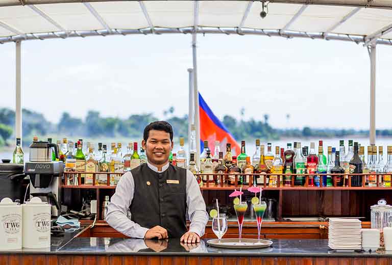 Relax and enjoy the passing sights on our 360-degree promenade decks