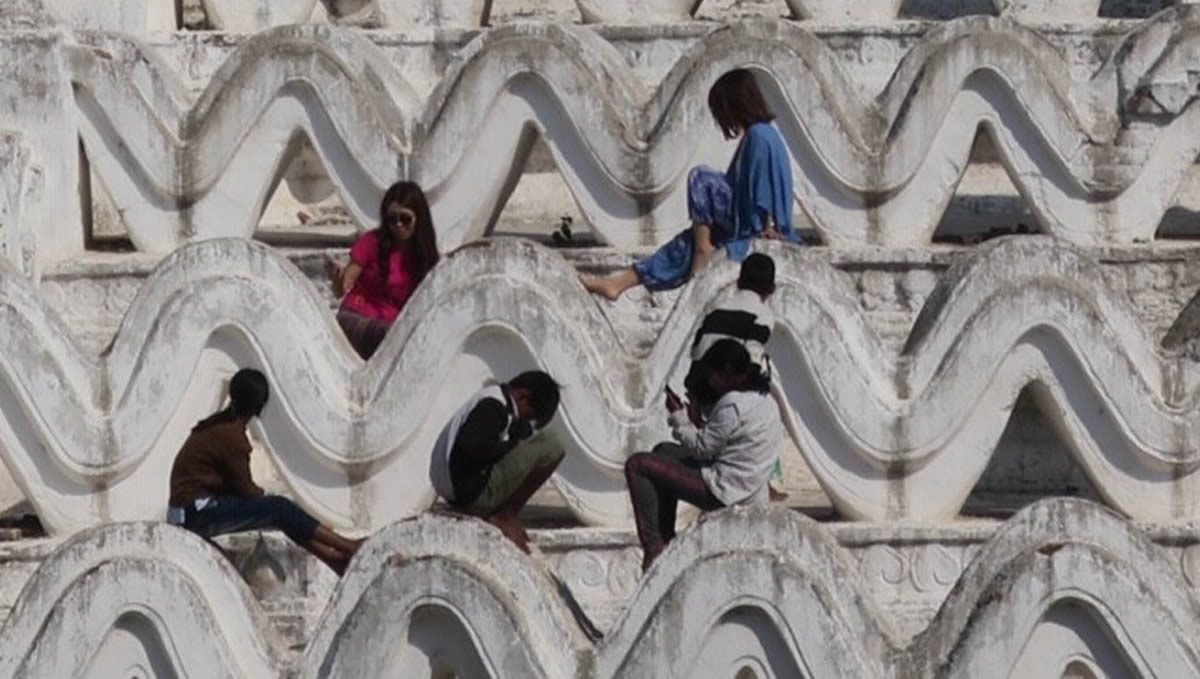 People relaxing on the Hsinbyume Pagoda